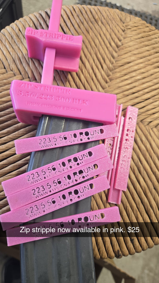 Pink Zip strippie speed loader .223 5.56 with 10 zippie speed strips.  $5 of which is donated towards breast cancer awareness